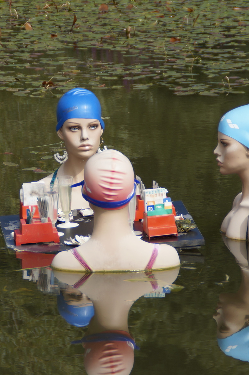 mermaid, tree, outdoors, swimmers, swim, dolls, art, human representation, transportation, real people, mermaids, mirroring, day, botanical garden, art object