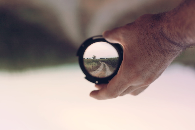 sphere, finger, person, holding, binocular, forecasting, filter, focus on foreground, body part, human body part, path, human hand, zoom, road, adult, nature