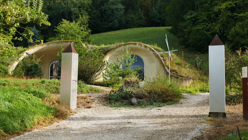 embedded in environment, architecture, den, the way forward, land, direction, tranquility, footpath, sunny, art, outdoors, tree, landscape, plant, built structure