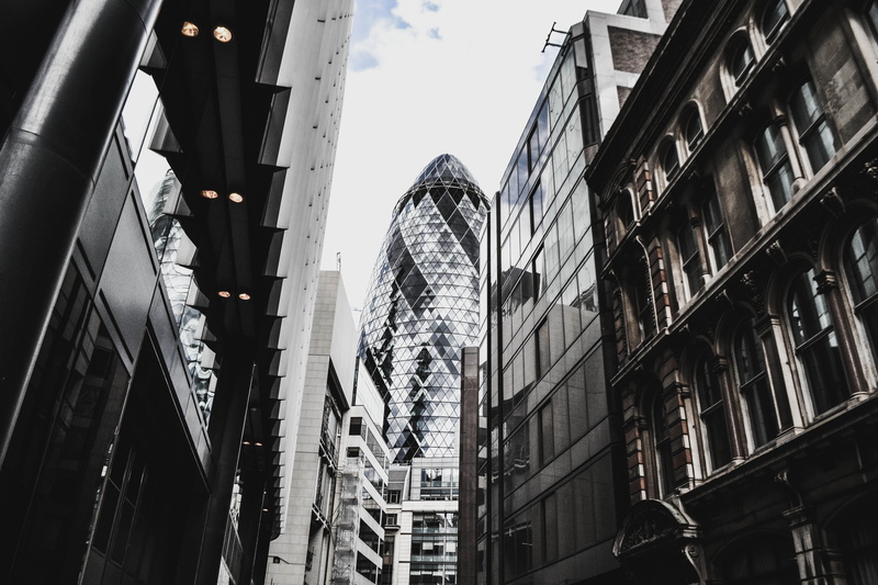 city, street, built structure, gherkin, building exterior, tall - high, tower, high, axe, glass, financial district, skyscraper, no people, buildings, day