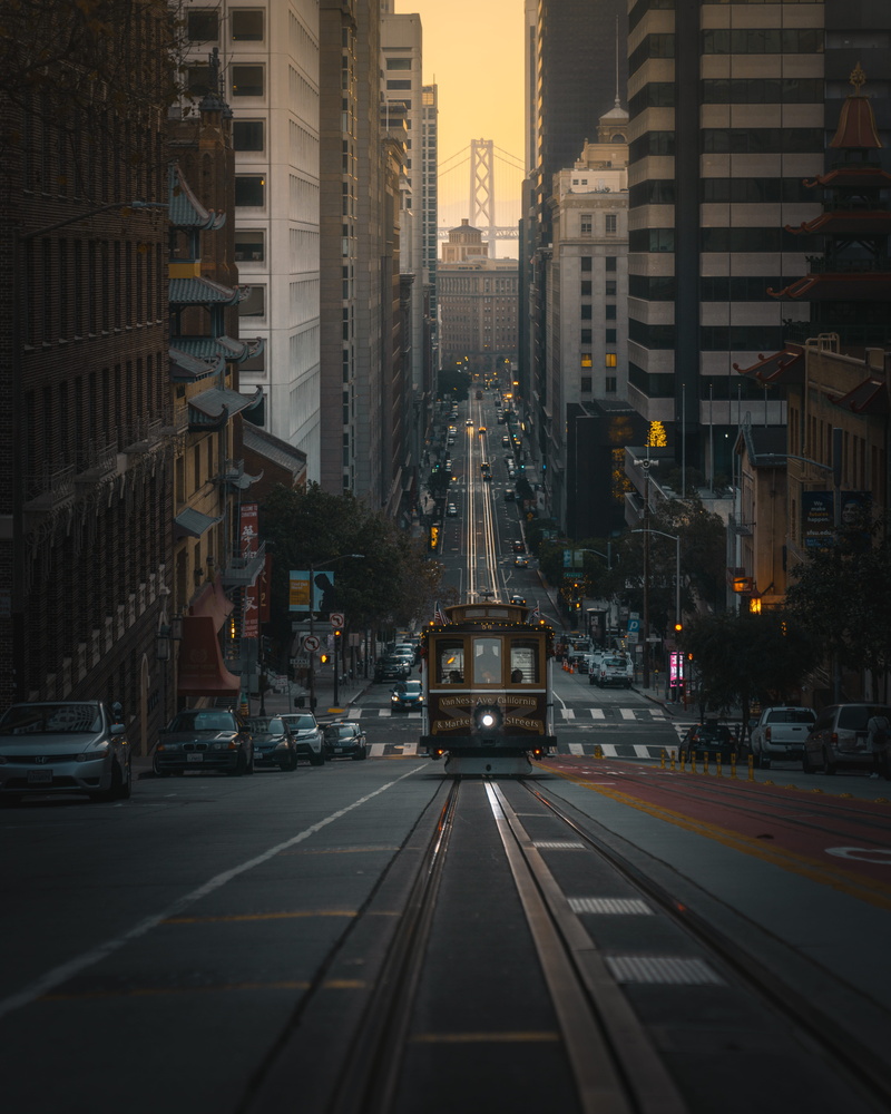 downtown, office building exterior, building, marking, city life, road, motor vehicle, street, tram lines, car, city street, road marking, mode of transportation