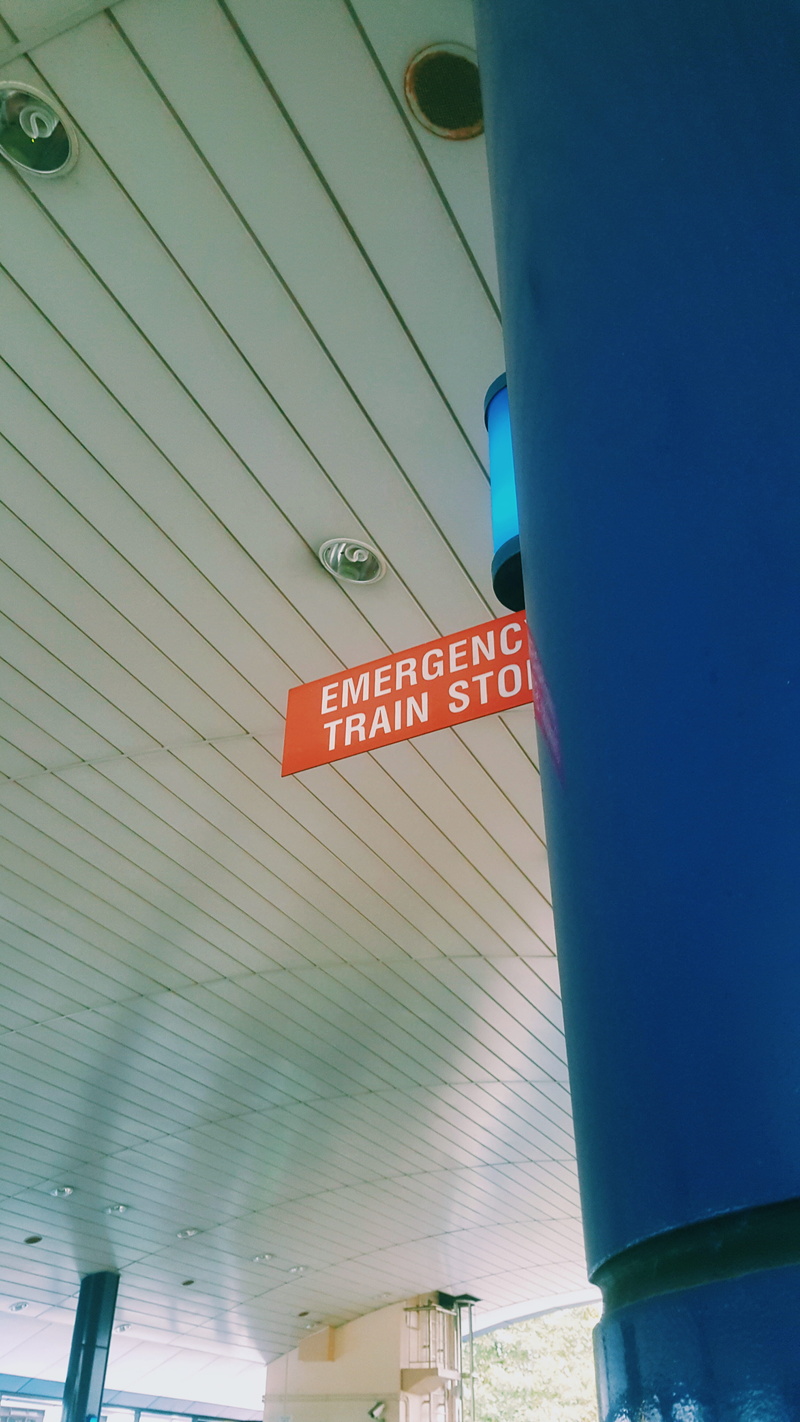 built structure, text, station, signal, blue, singapore, stop, architecture, shelter, bulb, sign, guidance, tram, train, lines, no people, pillar, track