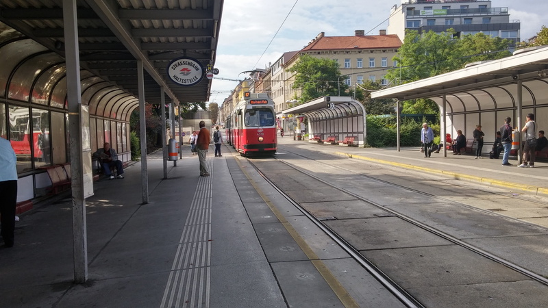 incidental people, austria, built structure, architecture, Tram, train, real people, railroad station platform, Bim, cable car, group of people, men, outdoors