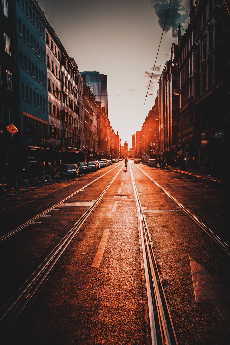 tram lines, town, urban, middle, sign, riding, direction, building, track, built structure, 5K, downtown, rail transportation, architecture, city, diminishing perspective