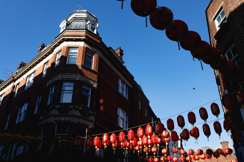 women, chinese new year, clear sky, city, building, china, blue sky, window, crowd, united kingdom, chinese, large group of people, men, lighting equipment
