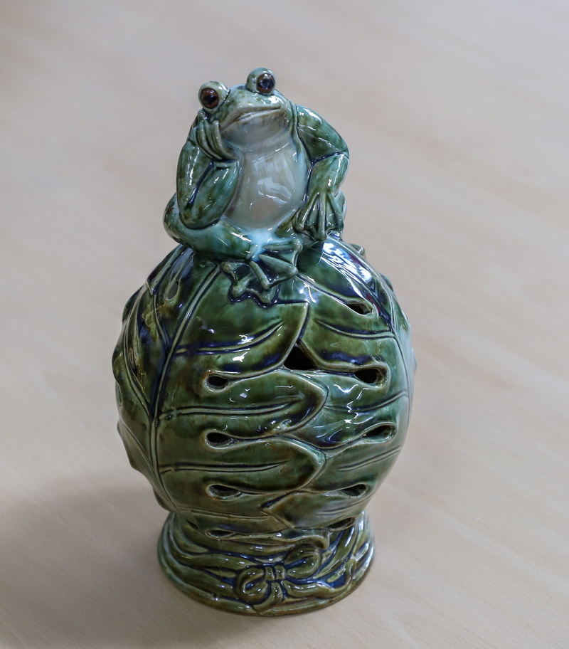 glass - material, green color, sculpture, transparent, metal, 2K, one, container, craft, human representation, art and craft, representation, table, creativity