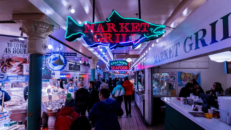 crowd, seafood, women, group of people, real people, men, communication, large group of people, consumerism, neon, signage, store, retail, commercial sign