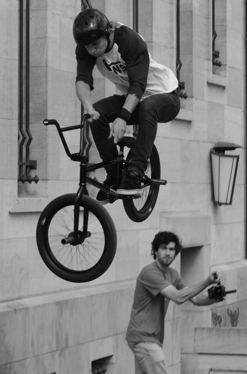 young adult, full length, real people, standing, people, bicycle, withdrawal, architecture, side view, bmx, sports, jump, casual clothing, day, lifestyles