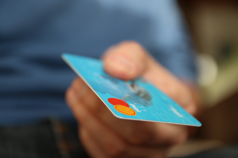 human body part, focus on foreground, holding, craft, payment, hand, finance, card, master, business, 5K, technology, bokeh, activity, selective focus