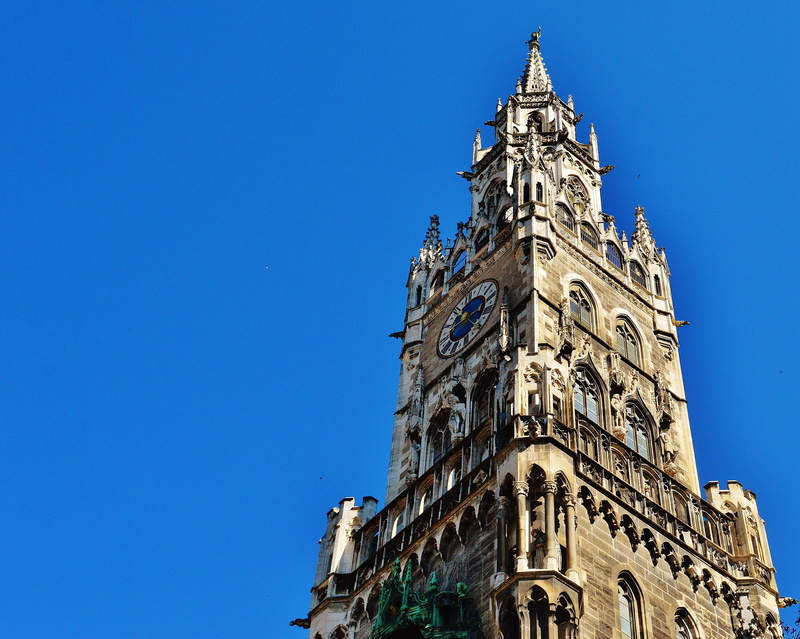 low angle view, clear sky, architecture, outdoors, copy space, building exterior, blue, clock, travel destinations, city, history, building, place of worship