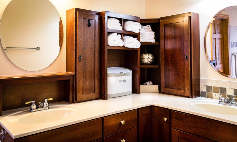 mirror, cabinets, storage, indoors, wealth, faucet, home interior, towel warmer, bathroom sink, hygiene, wood - material, sinks, household equipment, shelves