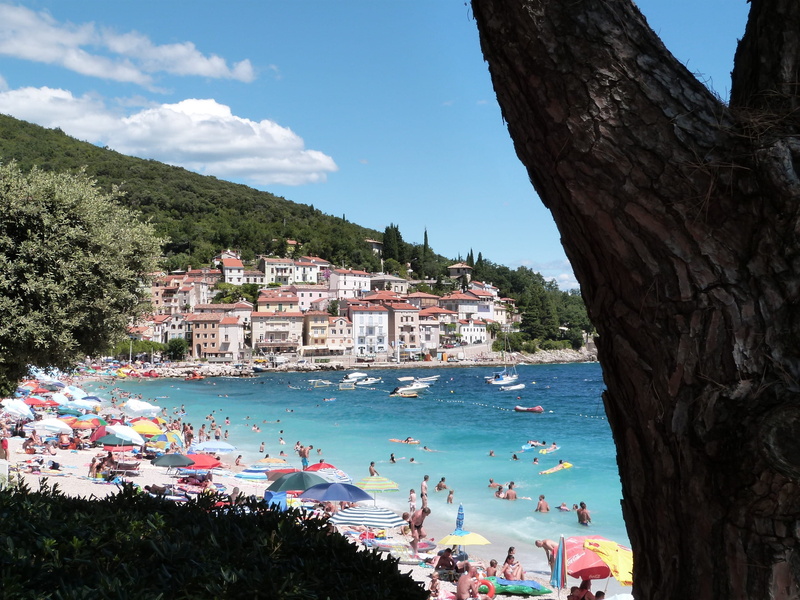 bathing, houses, tourist place, group of people, outdoor, hill, relaxation, people, boats, holiday, day, sky, paradise, nature, shore, water, coast, beach