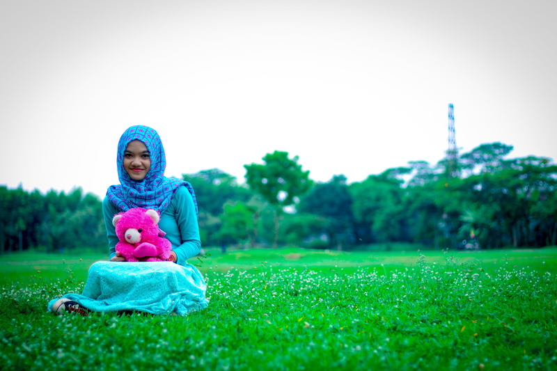 green grass, religion, clothing, grass, women, muslim, outdoors, eurasian, young girl, happiness, girl, field, siting, sky, garden, blue gress, toys, child