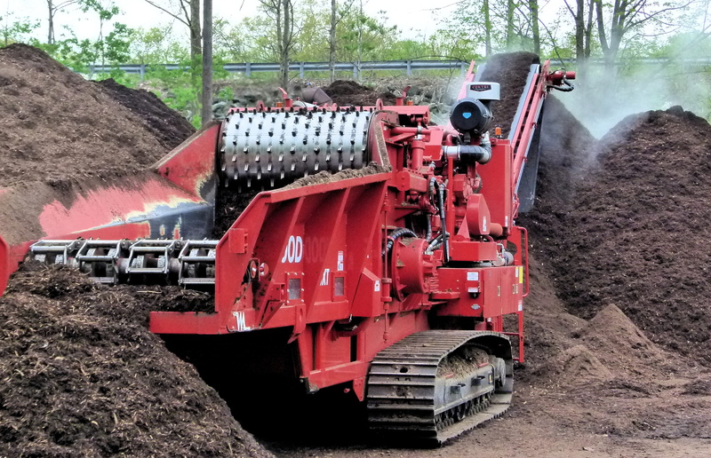 red, rail transportation, wood chipper, land, compost grinder, mulch, machinery, commercial land vehicle, motion, train, no people, construction machinery