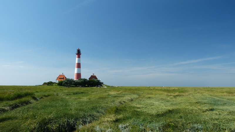 wadden sea, day, guidance, building exterior, beauty in nature, white, outdoors, built structure, westerhever, environment, plant, blue, nature, national park