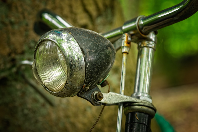 rusted, locomotion, cycling, turned off, outdoors, music, handlebars, wheel, lamp, brake, gray, transportation, bicycle, rusty, lighting equipment, photo