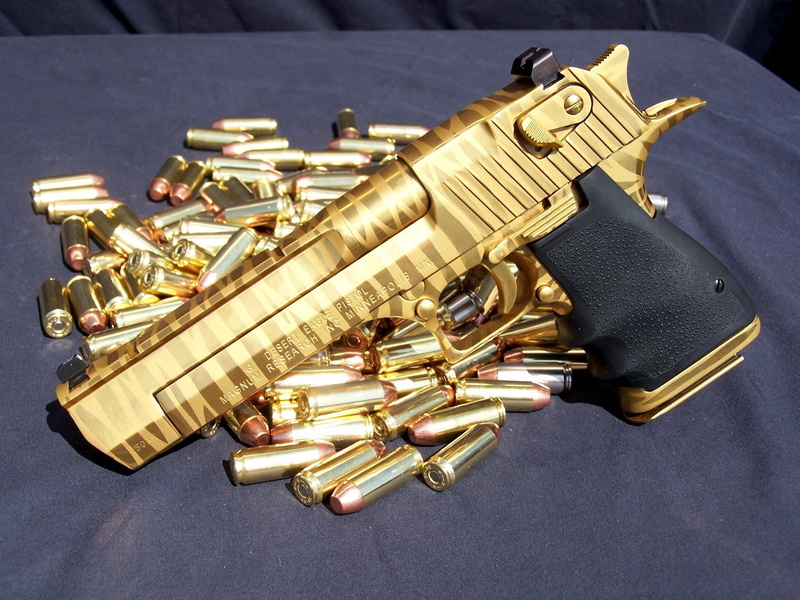 gun, colored, brass, 1080P, indoors, gold ammo, handgun, war, close-up, high angle view, Desert eagle, day, still life, bullet, rifle, ammunition, focus on foreground