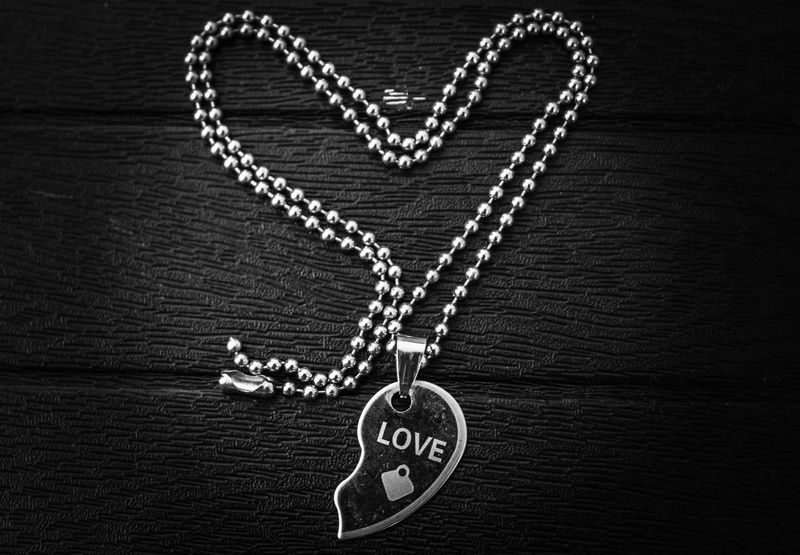 western script, wedding, close-up, locket, emotion, jewelry, dollar sign, no people, pendant, celebration, positive emotion, white, design, decorative
