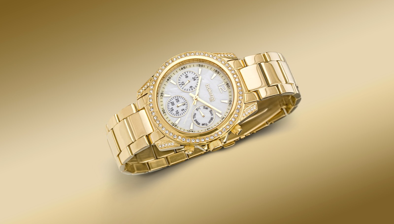 wristwatch, single object, time, studio shot, close-up, finance, dollar sign, clock, gold colored, jewelry, indoors, wealth, no people, accuracy, personal accessory