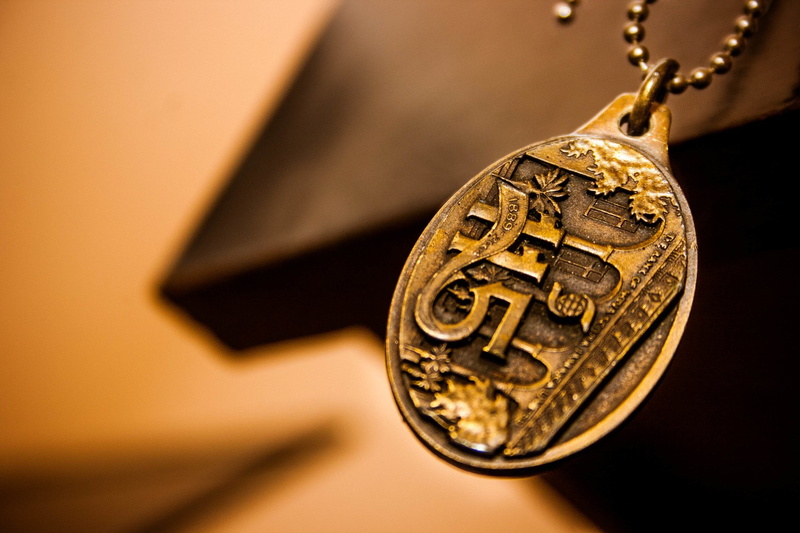 close-up, gold colored, Gift, black background, no people, dollar sign, gold, single object, history, business, coin, Misc, jewelry, studio shot, focus on foreground