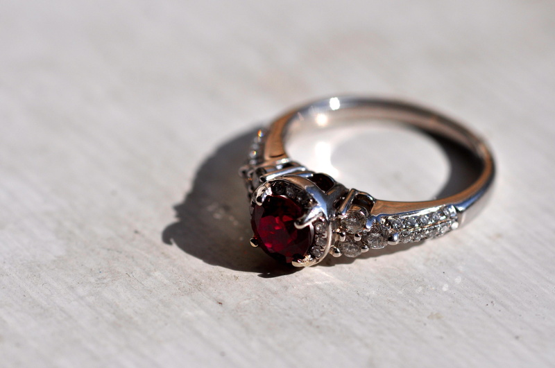 still life, personal accessory, diamond ring, selective focus, diamond - gemstone, wealth, metal, luxury, ring, jewelry, table, indoors, no people, gemstone