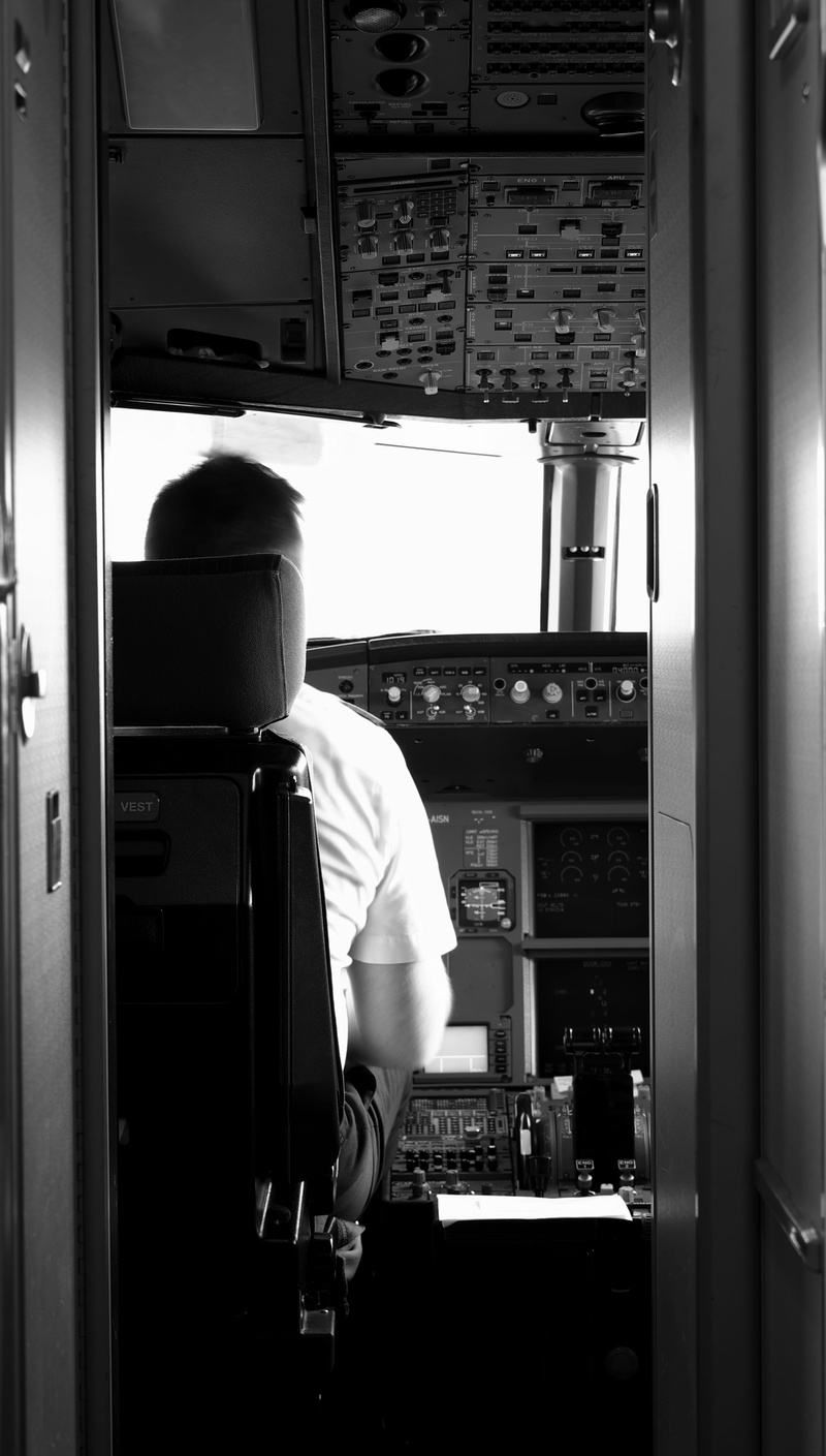 lifestyles, transportation, control, one person, occupation, real people, architecture, manage, drive, plane, adult, flight, command, rear view, refrigerator
