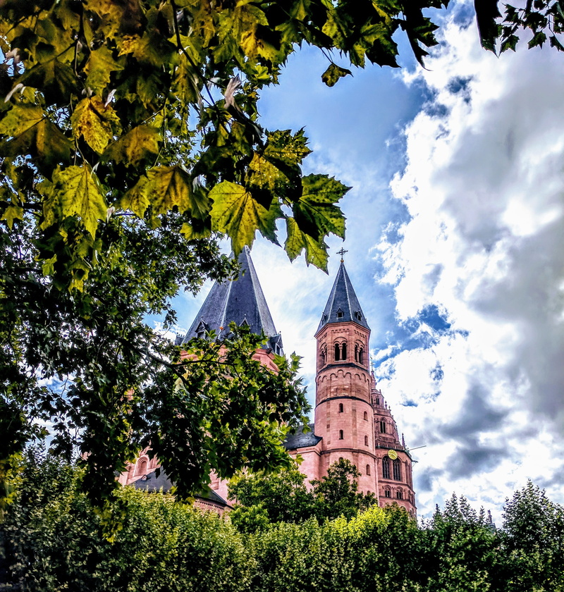 no people, structures, place of worship, outdoors, jesus, belief, brick, sky, monument, low angle view, tourism, historic center, tower, dom, plant, culture