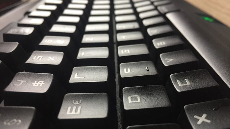 indoors, keyboard, wireless technology, input device, computer part, selective focus, periphaerie, no people, technology, communication, alphabet, laptop