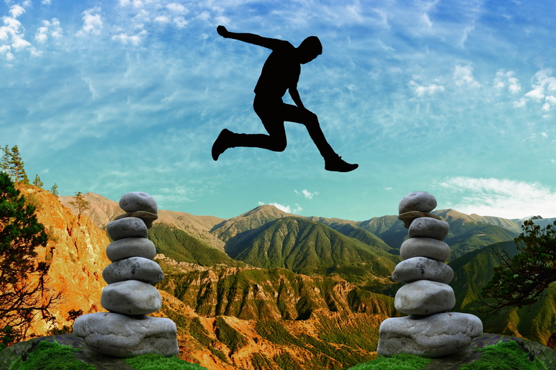 beauty in nature, cloud - sky, day, nature, stones, real people, daring, jumping, meditation, human arm, sky, risky, one person, scales, leisure activity