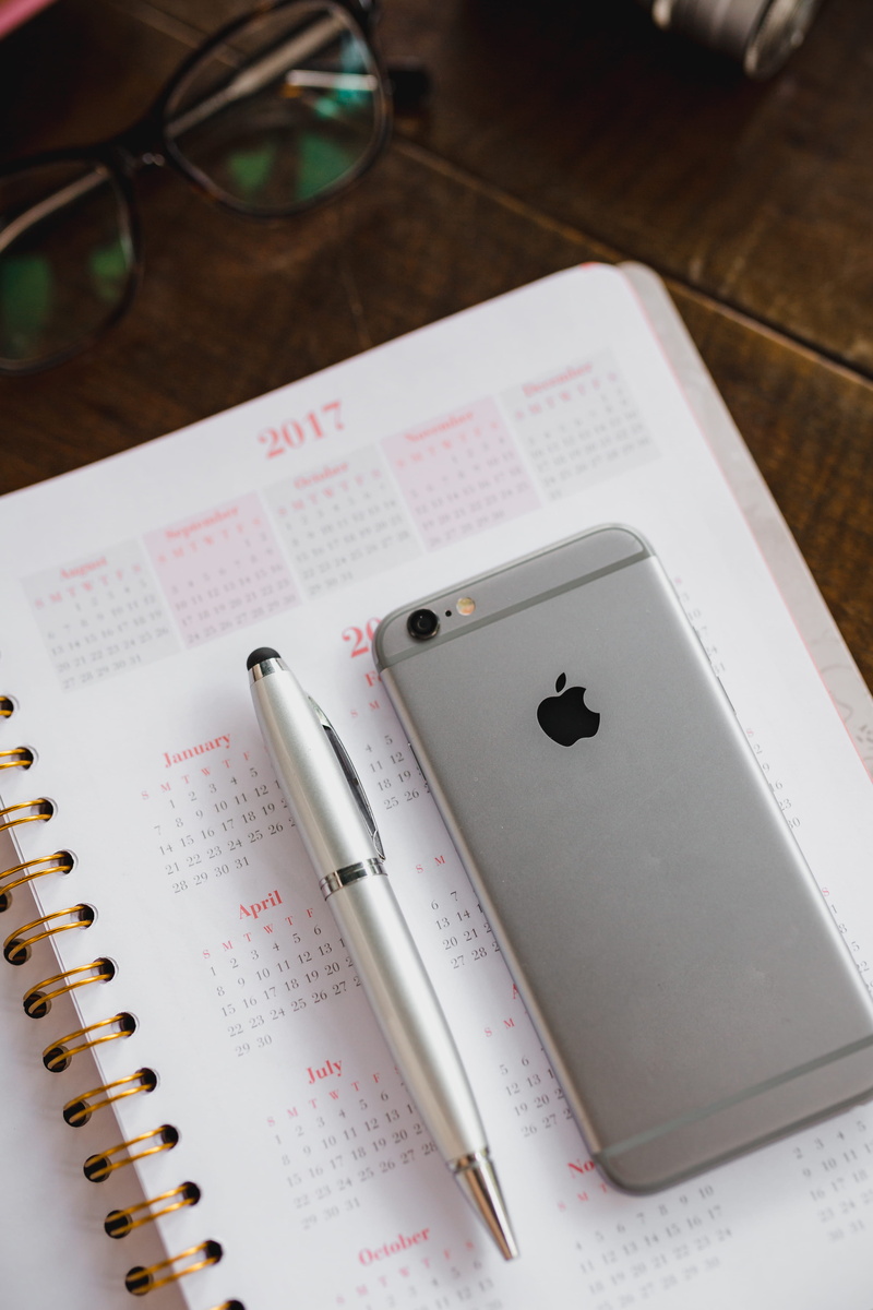note, writing instrument, notebook, spiral notebook, desk, day, close-up, technology, communication, text, table, high angle view, paper, no people, still life