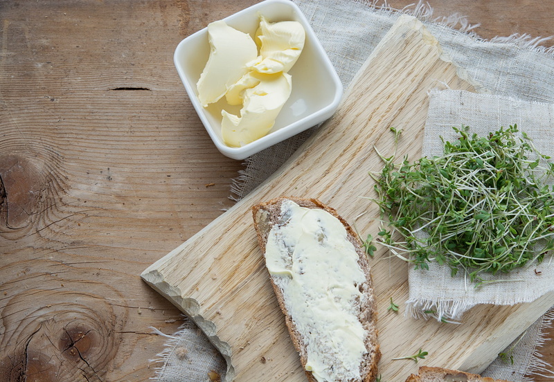 wooden board, indoors, bread and butter, butter, cress, wellbeing, food, wood - material, freshness, french food, no people, natural product, table, healthy eating
