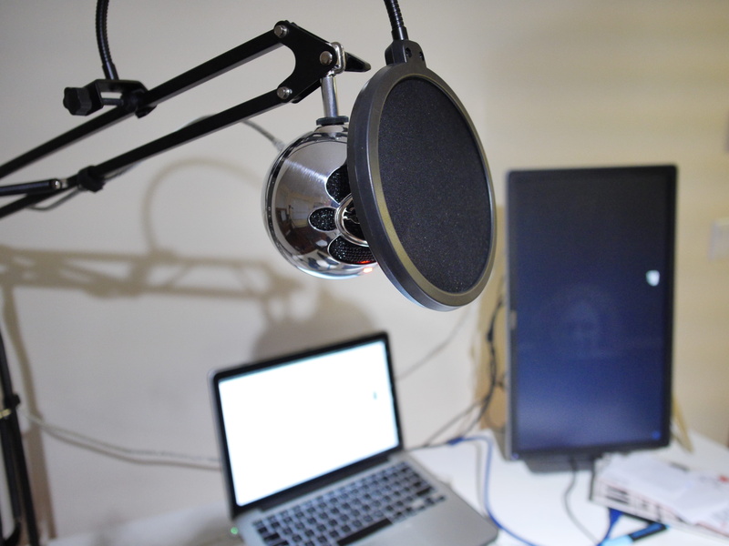 keyboard, headphones, filming, display, screen, laptop, indoors, computer, recording studio, studio, home video camera, furniture, table, computer hardware