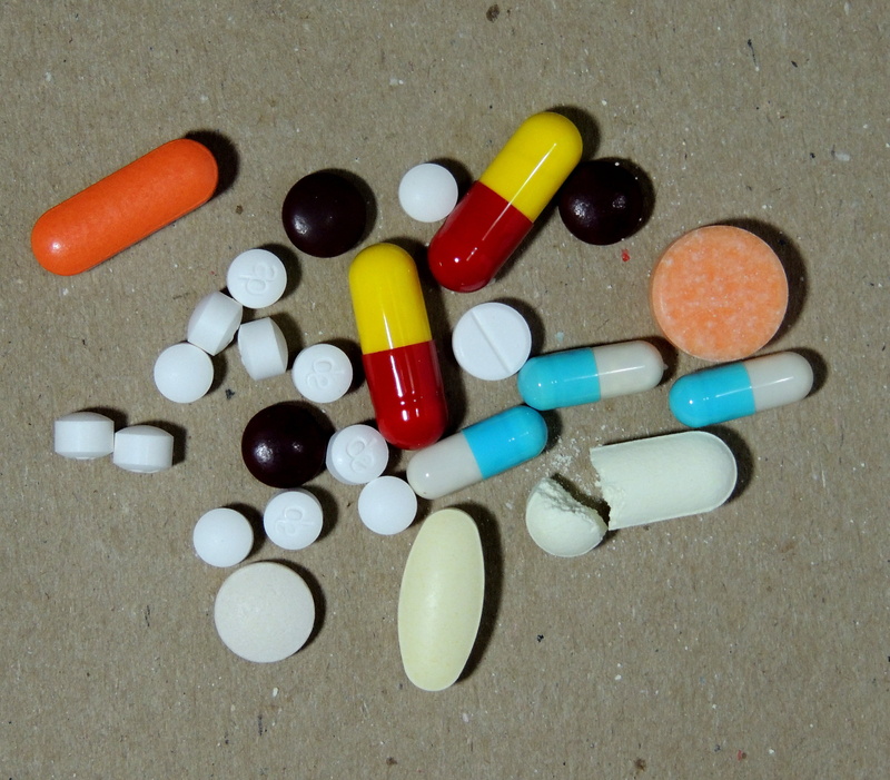 pill, table, high angle view, group of objects, capsule, medicine, still life, close-up, variation, diseases, shape, choice, no people, healthcare and medicine