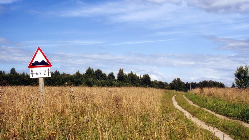 nature landscape, road, road sign, warning sign, rural scene, outdoors, tranquility, scenics - nature, environment, grass, landscape, field, cloud - sky