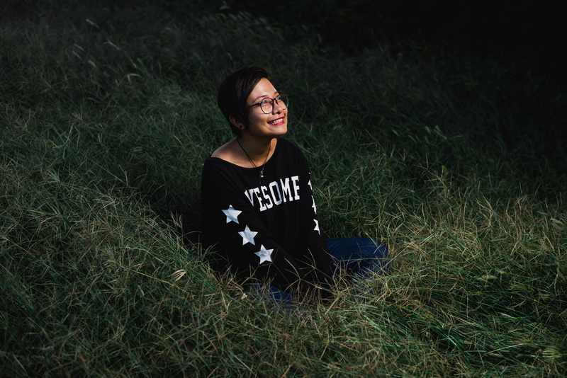 young adult, front view, lifestyles, girl, woman, nighttime, growth, field, hairstyle, happiness, casual clothing, smiling, image, caucasian Ethnicity
