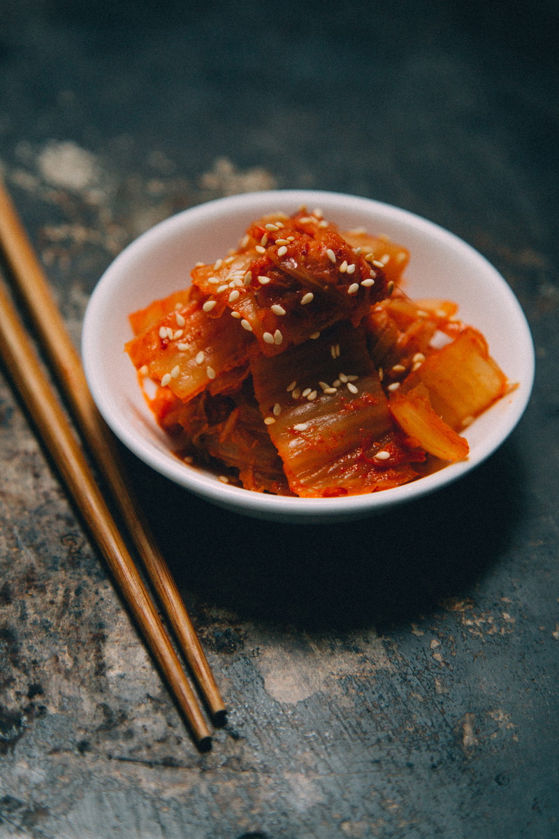 no people, cabbage, healthy eating, healthy, kimchi, eat, high angle view, sesame seeds, wood - material, table, minimal, japanese food, close-up, chopsticks