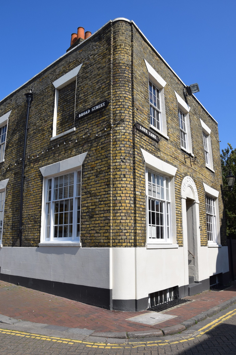 built structure, building, nature, entrance, sunlight, door, brick, city, day, corner house, facade, home, architecture, footpath, clear sky, window, england