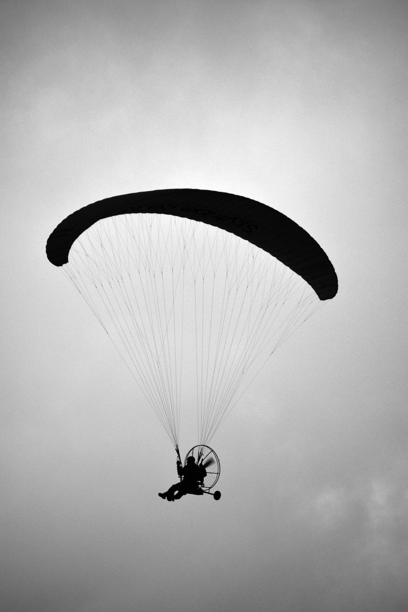 black and white, exhilaration, flying, real people, motion, explore, 5K, lifestyles, mid-air, day, cruise, outdoors, south africa, leisure activity, excitement