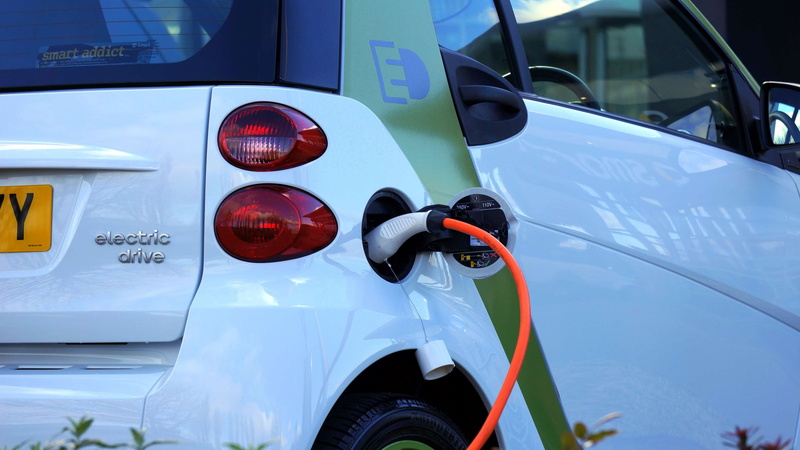 charge, red, car, stationary, environment, electric, outdoors, travel, socket, white color, mode of transportation, refueling, vehicle, modern, green, fuel and power generation