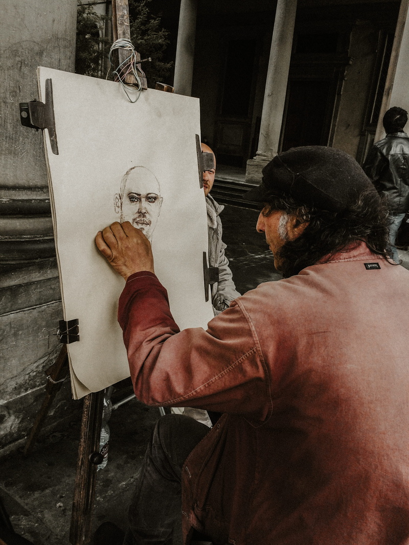 mature men, adult, indoors, holding, skill, unique, lifestyles, love, sketching, artsy, leisure activity, men, mature adult, art and craft, sitting, casual clothing