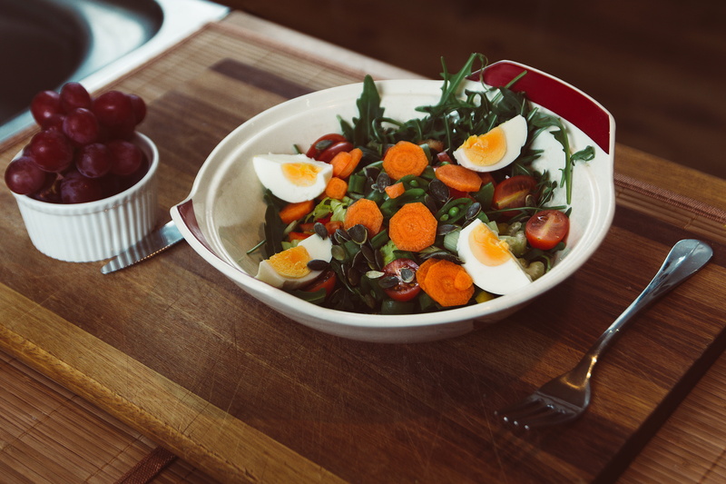 knife, bread, plate, tray, meal, kitchen utensil, tomato, bowl, fruit, grape, board, high angle view, beside, wellbeing, cherry tomato, boiled egg, vegan