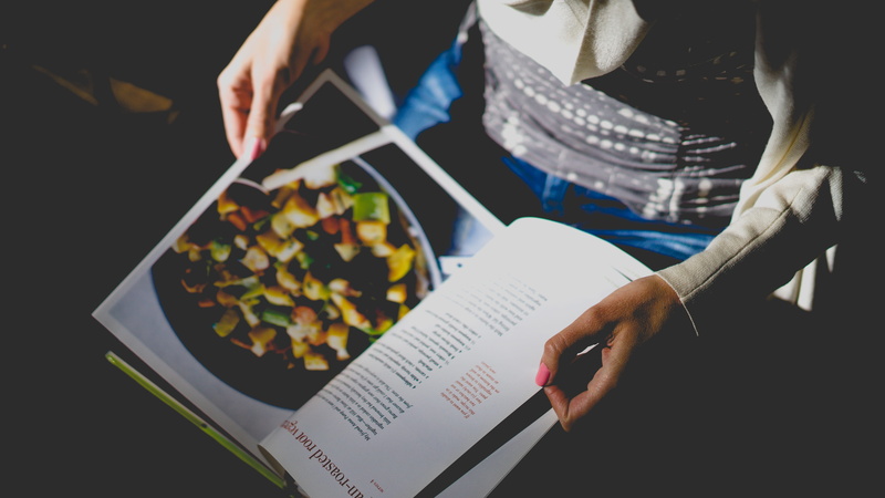 adult, human body part, human hand, cookbook, food, magazine, skill, looking, adults only, 5K, day, indoors, real people, writing, midsection, wireless technology