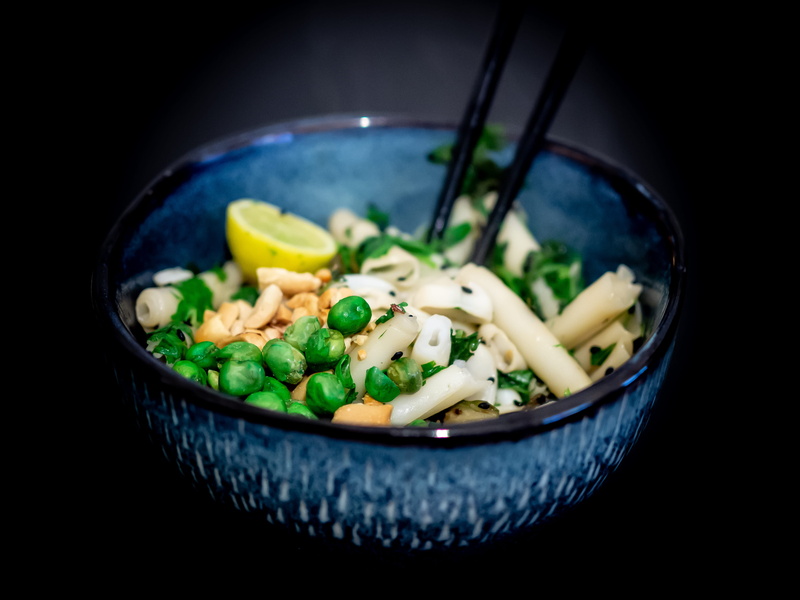 black background, studio shot, green bean, indoors, tortellini, stew, spoon, bean, close-up, asian food, produce, kitchen utensil, eating utensil, food and drink