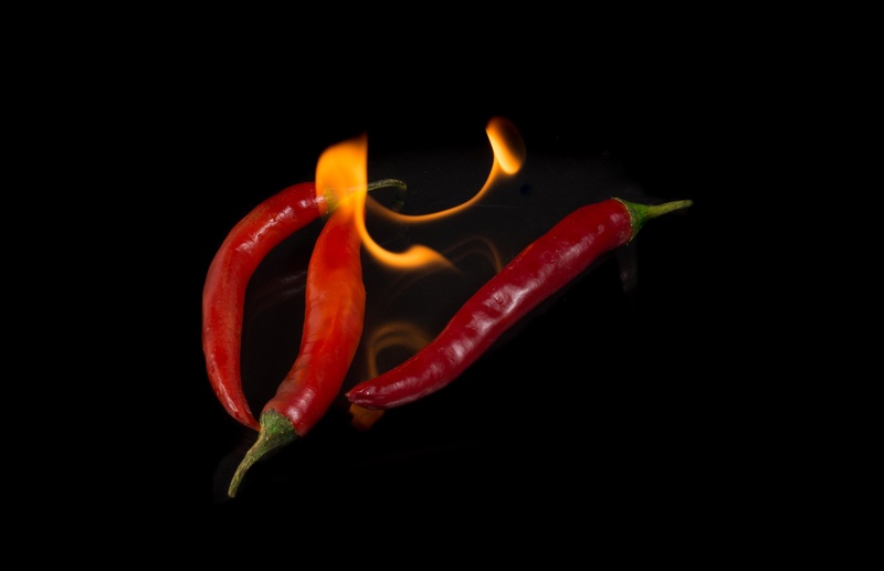 black background, pepper, bell pepper, food, paprika, spice, plant stem, 2K, close-up, still life, studio shot, single object, heat - temperature, pepper - vegetable