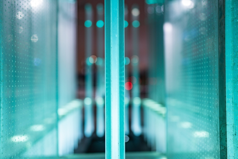 24mm, built structure, pattern, architecture, corridor, door, close-up, background blur, abstract, blue, background defocus, focus on foreground, outdoors
