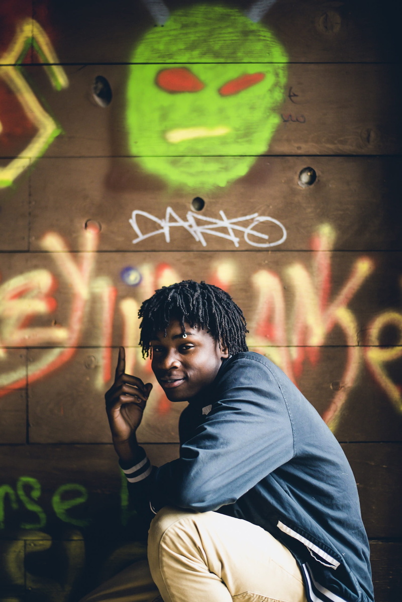 males, art, communication, braids, architecture, photo, young adult, looking, natural, casual clothing, male, man, grafitti, built structure, wall, 2K