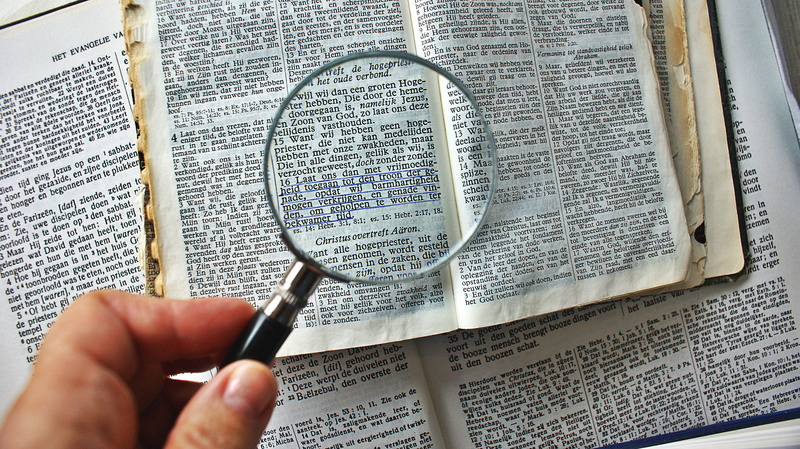 human body part, memory, book, activity, reading, bible, learning, holding, finger, magnifying glass, old, hand, one person, zoom, page, to enlarge, close-up