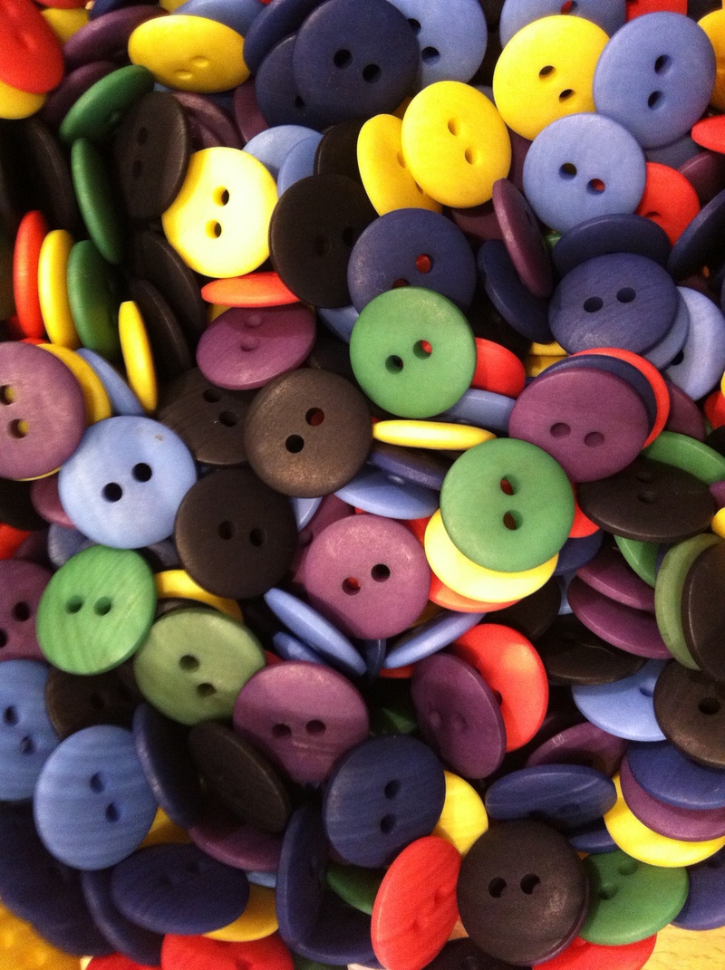shape, buttons, large group of objects, smarties, full frame, animal representation, indoors, texture, colors, still life, variation, geometric shape, food