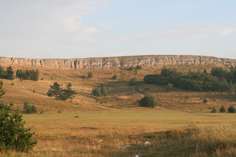 non-urban scene, landscape, crimea, ai-petri, outdoors, tranquil scene, plant, environment, mountains, sunlight, rocks, field, day, cloud - sky, beauty in nature