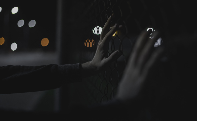 photography, no people, human Hand, wire, close, men, arms raised, fence, dark, grabing, human limb, gray, young adult, chainlink, portrait, bokeh, indoors